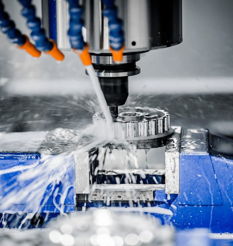5-axis CNC machining center with trunnion table and coolant