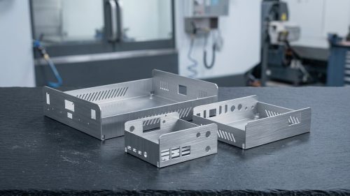 Sheet metal part drawings reference enclosures with cutouts and vents