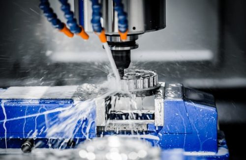 5-axis CNC machining center with trunnion table and coolant