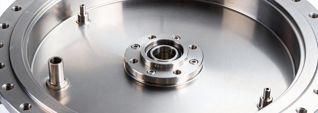 Finished 316 stainless steel vacuum chamber housing with precision flanges