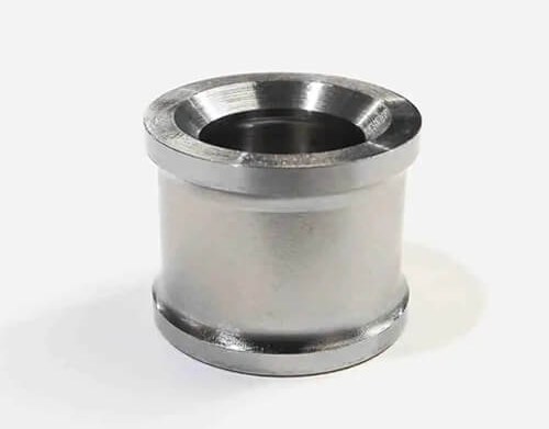 Stainless steel cylindrical machined part on white
