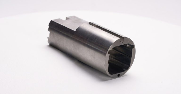 Machined metal telecom shielding component with precise cuts