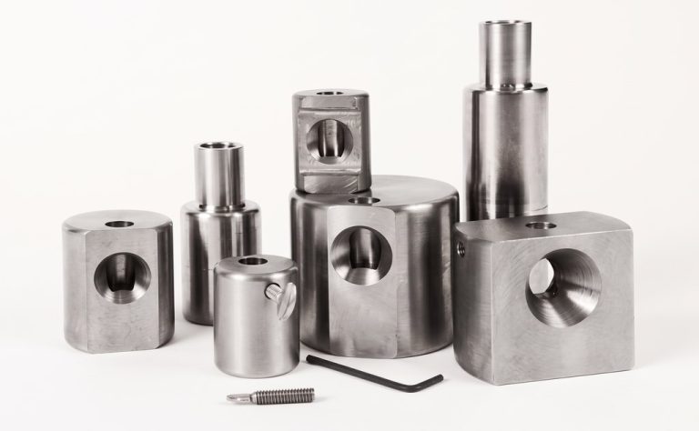 Precision machined metal parts with hex key and screw