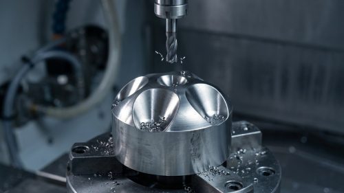 Titanium part being CNC milled, showing the cost of titanium machining