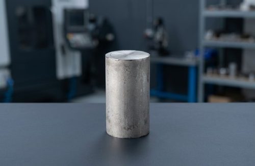 Raw titanium Grade 1 round bar stock before CNC machining