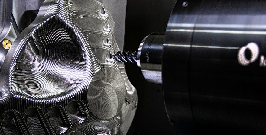 Multi-axis CNC machining of a complex hard metal part