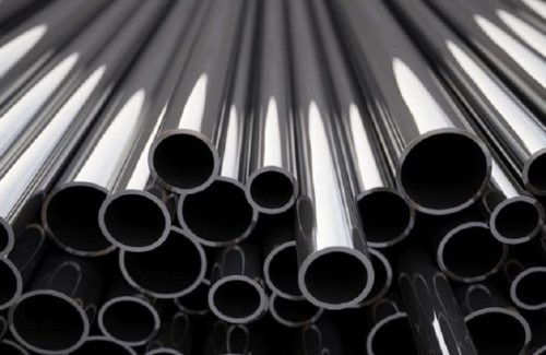 Stack of shiny metal tubes, close-up