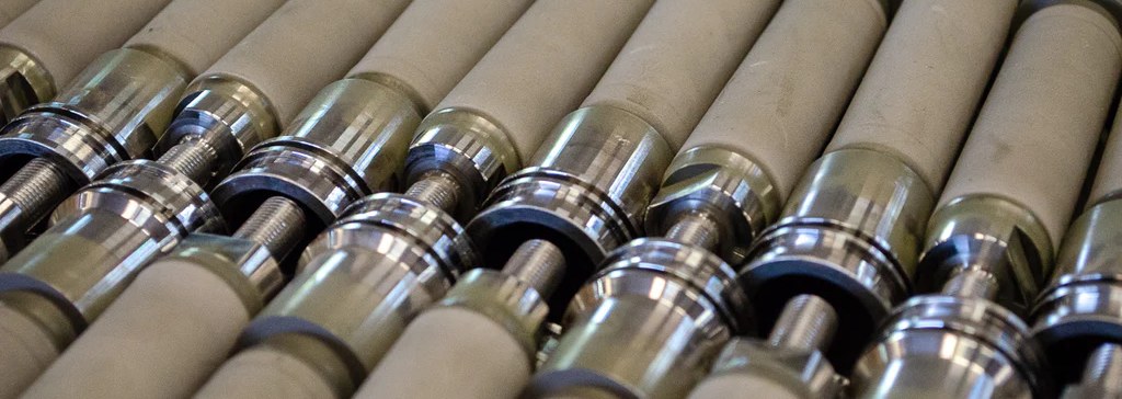 Rows of precision metal shafts with machined ends
