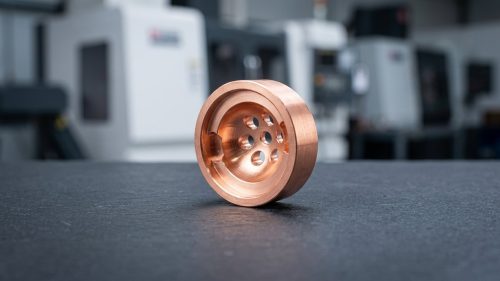 Machined copper fitting showing properties and precision CNC finish