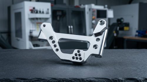 Vacuum metalizing coating on a CNC machined aluminum bracket